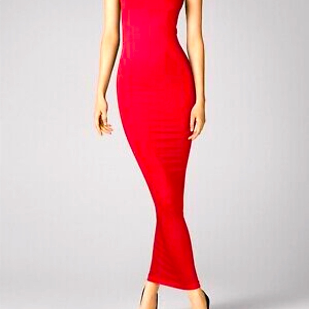 New with tags Wolford Fatal Lipstick dress.